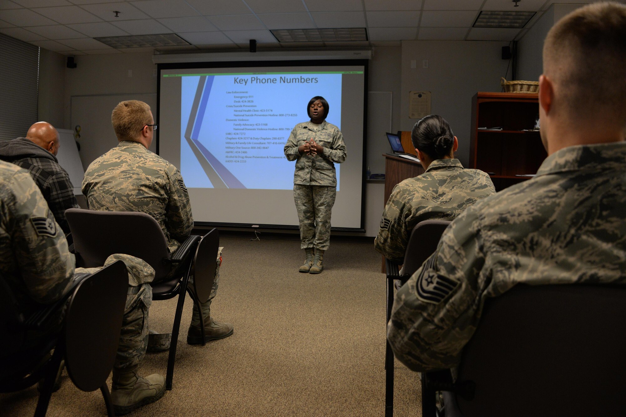 Tech. Sgt. Quintina Tatum, 60th Dental Squadron dental technician from Dallas, Texas, addresses a class of 40 Airmen during a Green Dot training session at Travis Air Force Base, Calif., Sept. 6, 2016. Tatum, a former corrections officer, has taught 10 classes since becoming certified in March 2016. Green Dot training is designed to provide Airmen with the tools to prevent power-based personal violence including sexual assault, domestic violence and bullying. (U.S. Air Force photo/Tech. Sgt. James Hodgman)