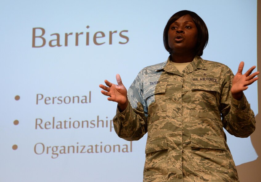 Tech. Sgt. Quintina Tatum, 60th Dental Squadron dental technician from Dallas, Texas, explains how personal, organizational and relationship barriers can provide challenges with intervening in difficult situations during a Green Dot training session at Travis Air Force Base, Calif., Sept. 6, 2016. Tatum, a former corrections officer, provided a class of 40 Airmen with several tools to overcome those barriers, often sharing stories from her time working in correctional facilities. Green Dot training is designed to provide Airmen with the tools to prevent power-based personal violence including sexual assault, domestic violence and bullying. (U.S. Air Force photo/Tech. Sgt. James Hodgman)