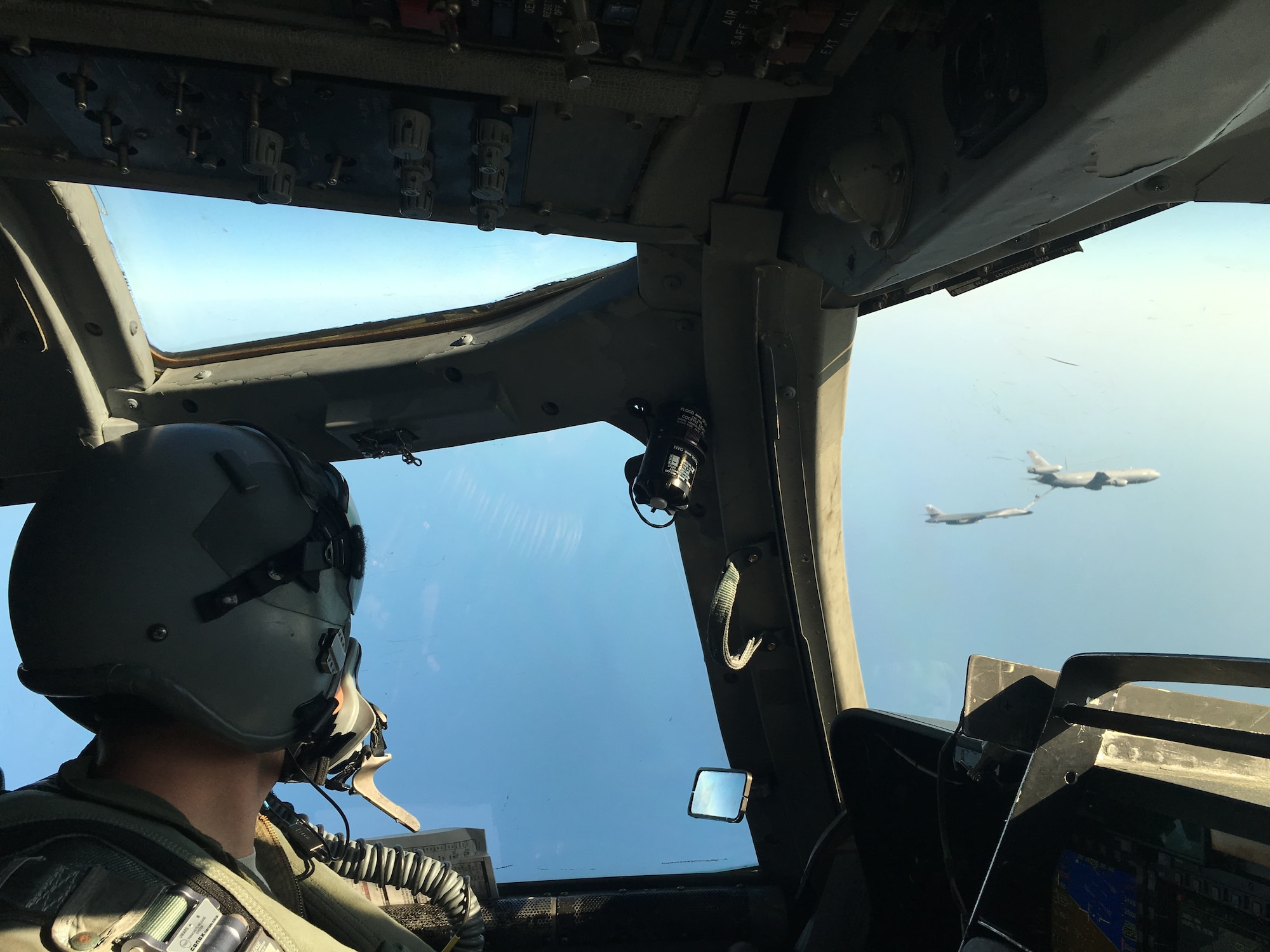 Delta, a 9th Bomb Squadron pilot, watches his team lead air refuel over the Pacific Ocean, March 2016. Dyess has been assisting the Joint Interagency Task Force South in their fight against drug trafficking from Latin America. In total, the 9th BS has dedicated more than 350 flight hours to this operation. (Courtesy photo)