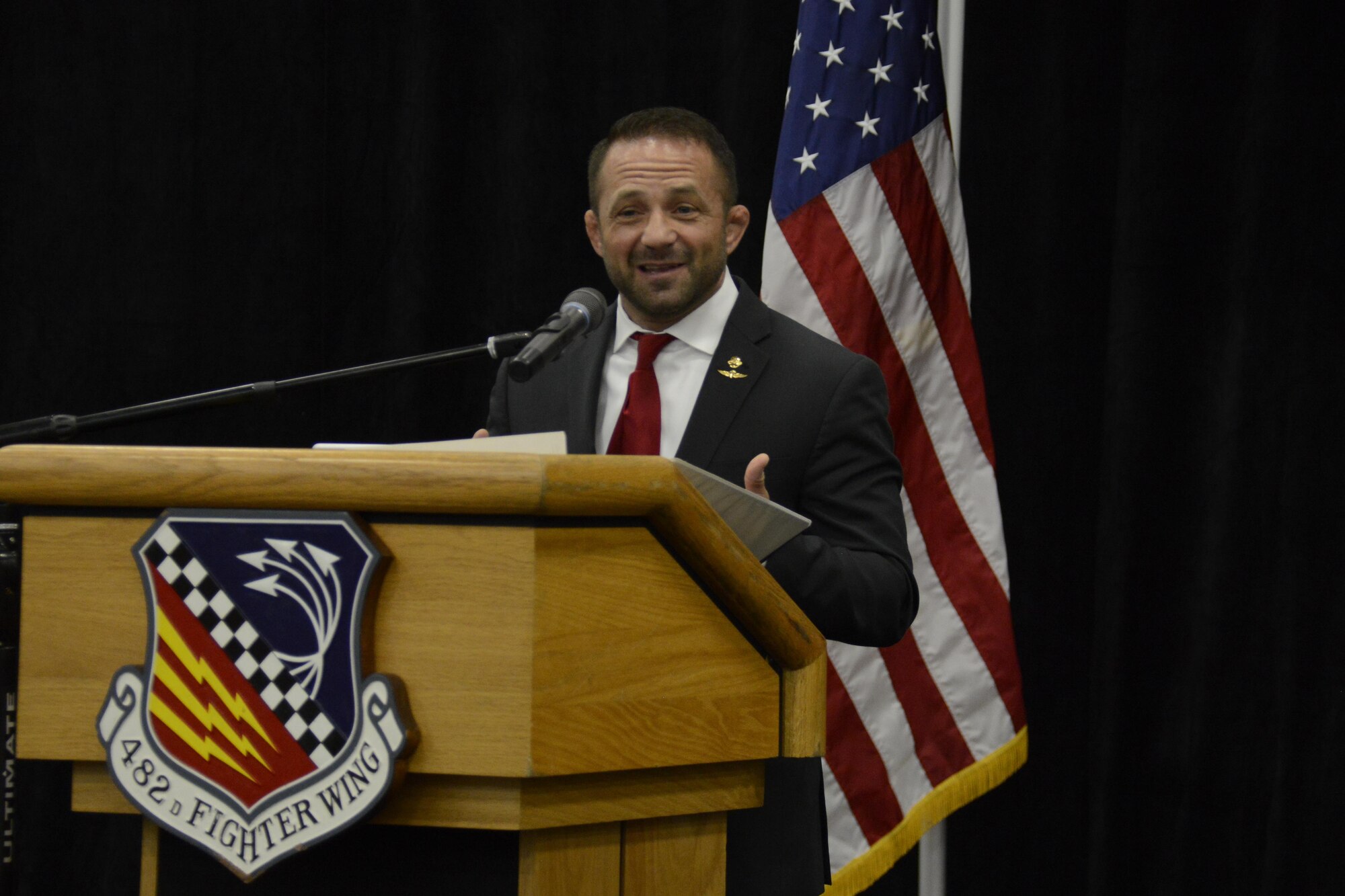 Chad Robichaux, the Mighty Oaks Warrior Program founder, speaks to more than 1,000 Airmen during Wingman Day in the Sam Johnson Fitness Center, Sept. 10. Robichaux’s program helps veterans with PTSD, pre and post deployers, and struggling marriages. (U.S. Air Force photo by Senior Airman Aja Heiden)