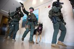 U.S. Soldiers assigned to The Old Guard 289th Military Police Company's Special Reaction Team, Fort Myer, Va., move to clear the area during the active shooter response training portion of Exercise Capital Shield 2016 at Fort Belvoir Community Hospital, Fort Belvoir, Va., Sept. 13, 2016. Exercises such as Capital Shield help service members prepare to support state and federal first responders in any type of contingency situation. (U.S. Army photo by Spc. Bernardus Pol)