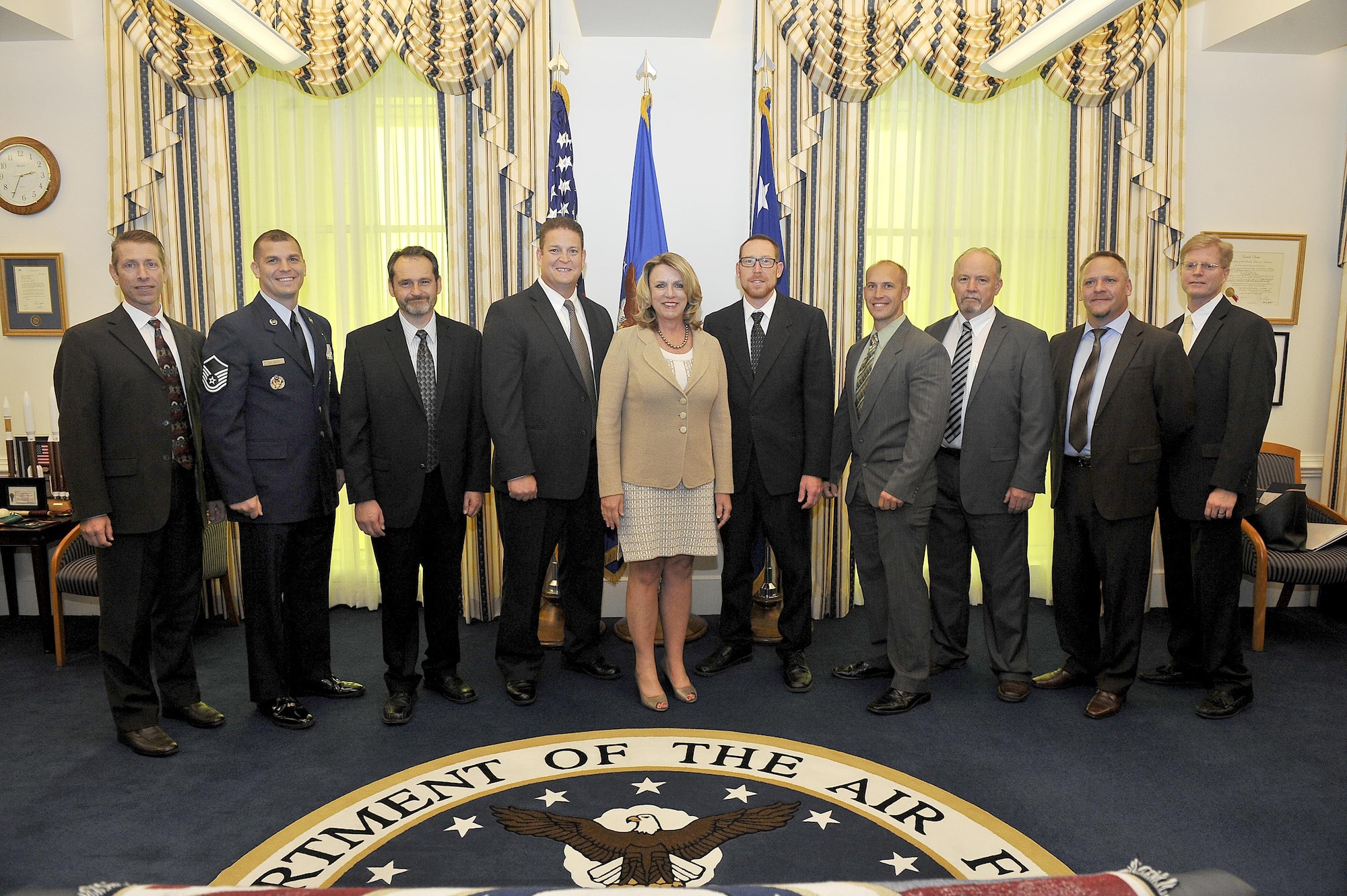 Air Force Secretary Deborah Lee James meets the Electro-Chemical Milling team, winners of the Gen. Larry O. Spencer Innovation Award, from Hill Air Force Base, Utah, during a Pentagon ceremony Sept. 16, 2016. The team is comprised of Trevor Foust, Brad Johnson, Daniel Minert, Jack Olsen, Steven Roskelley, Savanna J. Stepp, Trent Tholen, Erik Thompson, and Caleb Trammell. Master Sgt. Matthew Galinisky also won the award for his individual efforts. (U.S. Air Force photo/Tech. Sgt. Anthony Nelson Jr.)