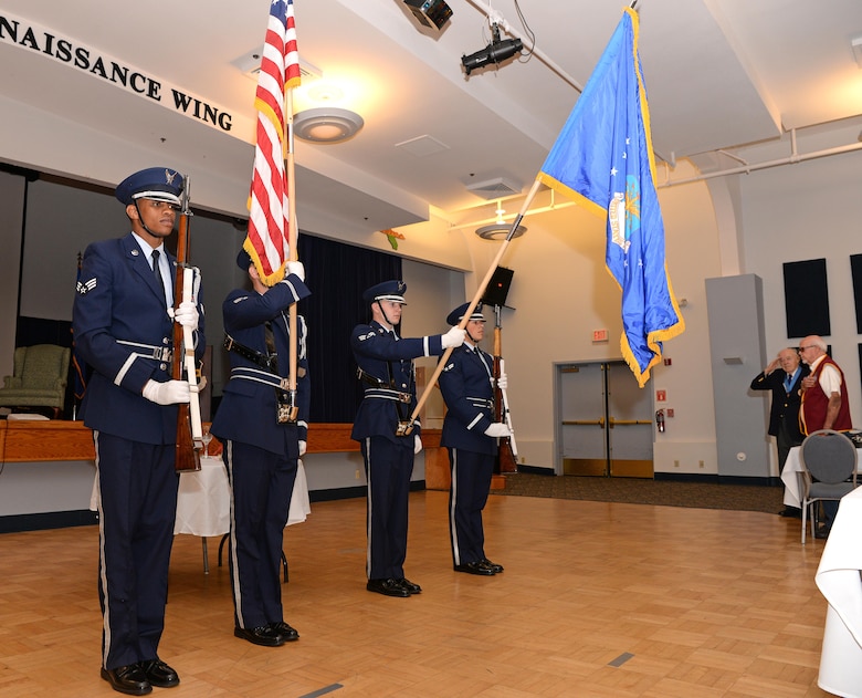 The Beale Air Force Base Honor Guard presents the colors during the singing of the national anthem at the POW/MIA ceremonial breakfast Sept. 15, 2016, at Beale Air Force Base, California. National POW/MIA Recognition Day is observed on the third Friday of September as a way to honor America's prisoners of war and missing in action. (U.S. Air Force photo/Airman Tristan D. Viglianco)