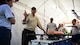 Charlie Jansen, a decontamination instructor, walks Fairchild Airmen through what they will be doing for the decontamination training exercise Sept. 16, 2016, at Fairchild Air Force Base, Wash. The Air Force contracts instructors to come and teach bases biannually making sure that Airmen have the best training possible. (U.S. Air Force photo/Airman 1st Class Sean Campbell)
