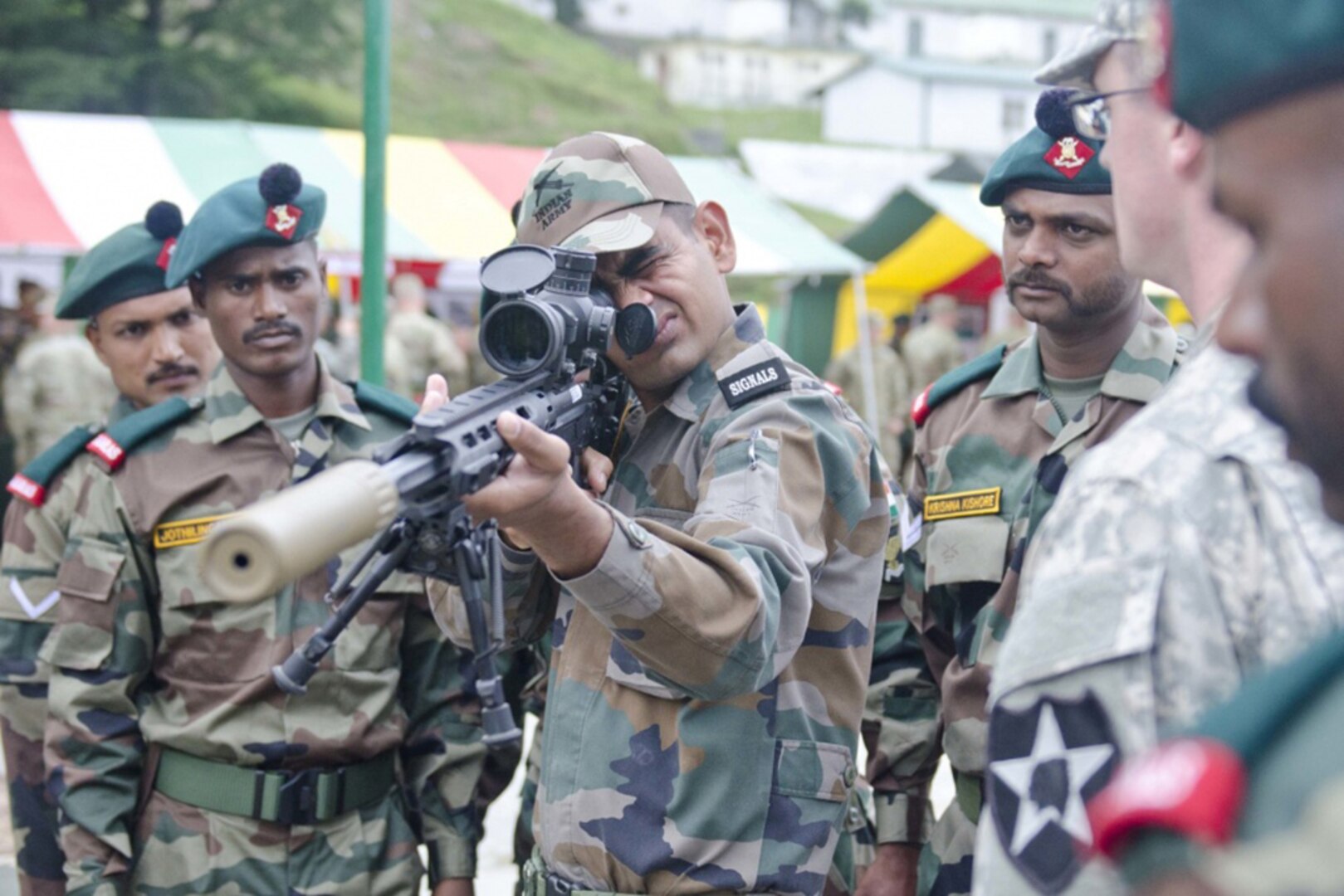 An Indian soldier looks down the sight of a sniper rifle during a weapons demonstration held Sept. 15, 2016, at Chaubattia, India. The weapons demonstration was part of Yudh Abhyas, a bilateral training exercise geared toward enhancing cooperation and coordination between the two nations through training and cultural exchanges.