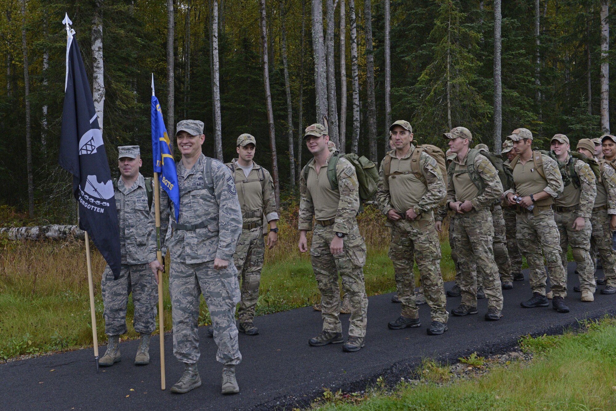 The 673d Medical Group hosted a POW/MIA ruck march at Joint Base Elmendorf-Richardson, Alaska, Sept. 16, 2016. More than 200 personnel including Airmen, Soldiers and Royal Canadian Air Force members, marched a total of five miles carrying 20 lbs. of canned food to deliver and donate to the Alaska Fisher House. 