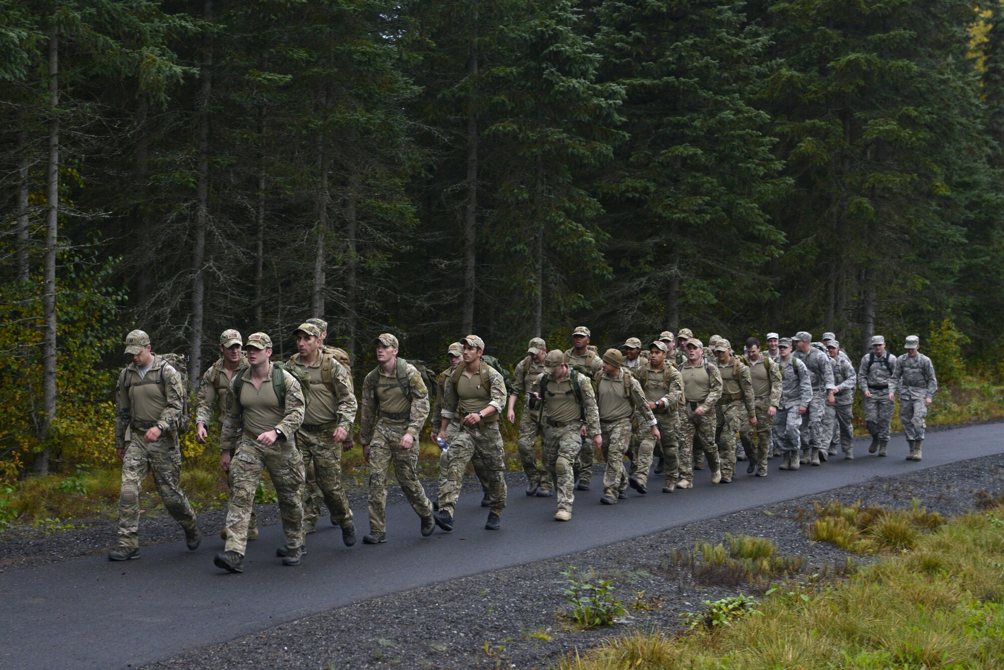 The 673d Medical Group hosted a POW/MIA ruck march at Joint Base Elmendorf-Richardson, Alaska, Sept. 16, 2016. More than 200 personnel including Airmen, Soldiers and Royal Canadian Air Force members, marched a total of five miles carrying 20 lbs. of canned food to deliver and donate to the Alaska Fisher House.