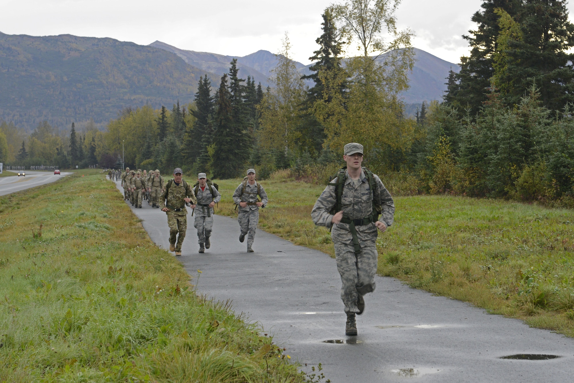 The 673d Medical Group hosted a POW/MIA ruck march at Joint Base Elmendorf-Richardson, Alaska, Sept. 16, 2016. More than 200 personnel including Airmen, Soldiers and Royal Canadian Air Force members, marched a total of five miles carrying 20 lbs. of canned food to deliver and donate to the Alaska Fisher House.