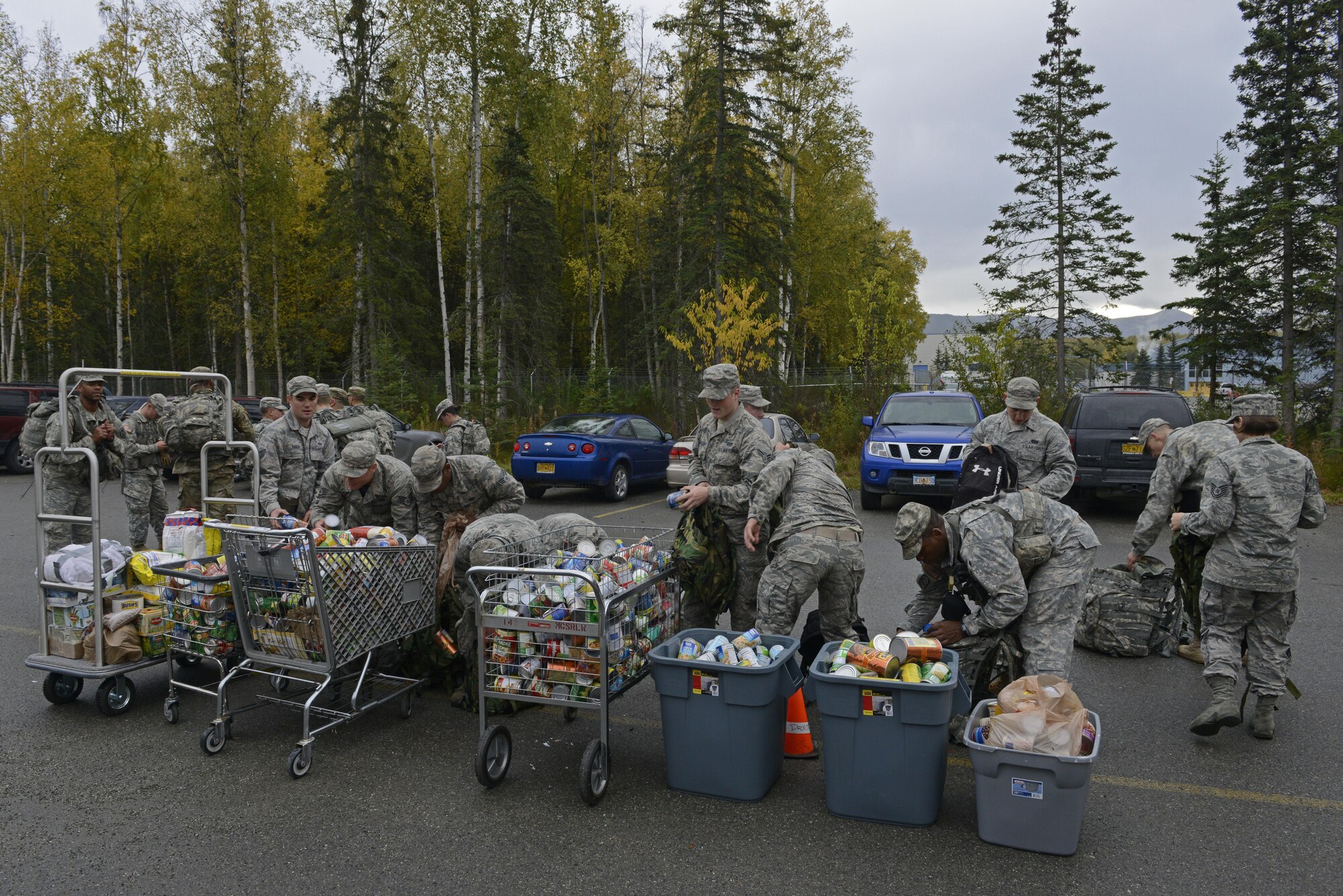 The 673d Medical Group hosted a POW/MIA ruck march at Joint Base Elmendorf-Richardson, Alaska, Sept. 16, 2016. More than 200 personnel including Airmen, Soldiers and Royal Canadian Air Force members, marched a total of five miles carrying 20 lbs. of canned food to deliver and donate to the Alaska Fisher House.