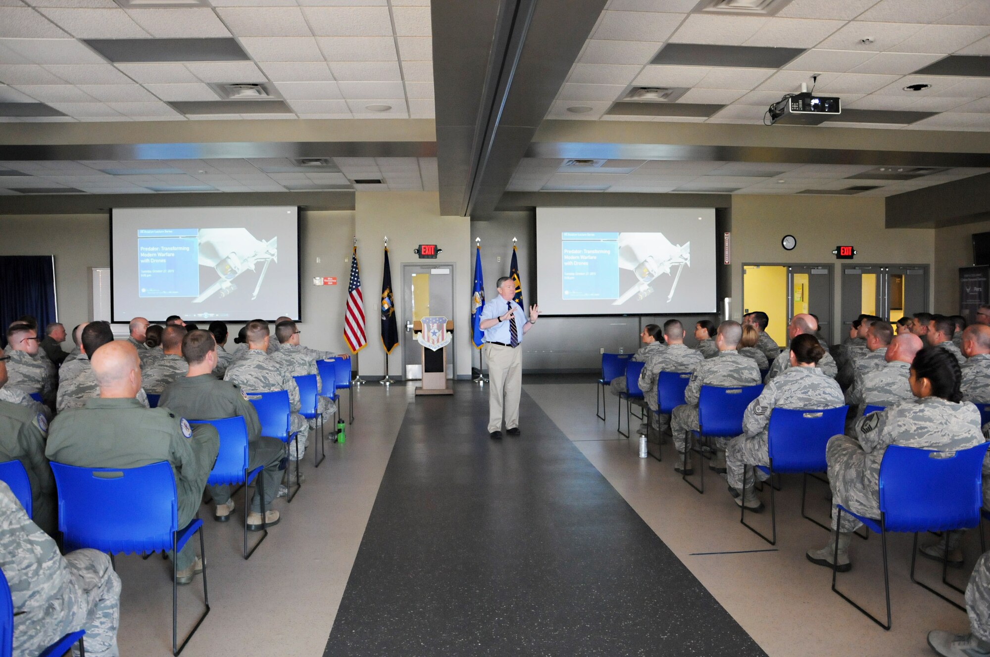 Service members from the 110th Attack Wing Battle Creek Air National Guard Base, Mich., gather for a distinguished presentation featuring Mr. James G. Clark, Director, Intelligence, Surveillance and Reconnaissance Innovation, Deputy Chief of Staff for ISR, Headquarters U.S. Air Force, Washington, D.C., Wednesday, August 17, 2016, Battle Creek, Mich. Mr. Clark reflected briefly on his service as a pilot in the U.S. Air Force, from which he retired in 2001 with the rank of Col., as well as his road to becoming a key innovator in RPA operations.(U.S. Air National Guard Photo by Master Sgt. Sonia Pawloski/released)