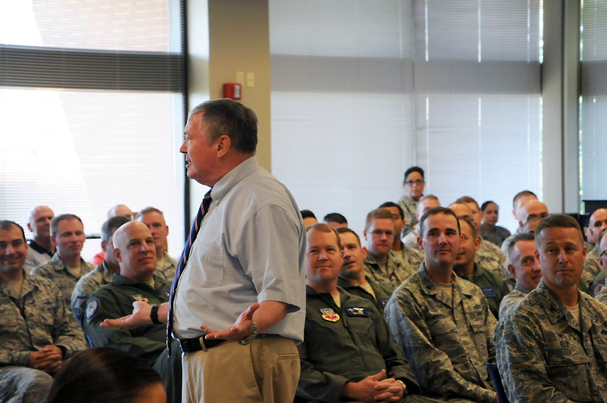 Service members from the 110th Attack Wing Battle Creek Air National Guard Base, Mich., gather for a distinguished presentation featuring Mr. James G. Clark, Director, Intelligence, Surveillance and Reconnaissance Innovation, Deputy Chief of Staff for ISR, Headquarters U.S. Air Force, Washington, D.C., Wednesday, August 17, 2016, Battle Creek, Mich. Mr. Clark reflected briefly on his service as a pilot in the U.S. Air Force, from which he retired in 2001 with the rank of Col., as well as his road to becoming a key innovator in RPA operations.(U.S. Air National Guard Photo by Master Sgt. Sonia Pawloski/released)