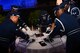 Honor guardsmen perform the five-hat ceremony during the Air Force Ball at the Sumter Civic Center, Sumter, S.C., Sept. 16, 2016. The ceremony symbolizes the spirit of POW/MIAs and honors their legacy of service and sacrifice. (U.S. Air Force photo by Airman 1st Class Christopher Maldonado)