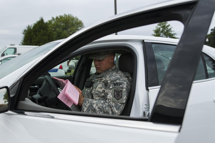 Spc. Bradley A. Skowronski, a U.S. Army Reserve military police Soldier assigned to the 102nd MP Company out of Sheboygan, Wisc., reviews a report at Fort Meade, Md., Sept. 16, 2016. Skowronski is part of a group of Soldiers participating in   the on going partnership between the 200th Military Police Command and the Military District of Washington.  Through this partnership, the military police Soldiers not only receive their law enforcement certification, they also get real-world experience, which is something they don’t get during a training exercise. (U.S. Army Reserve photo by Spc. Stephanie Ramirez) 