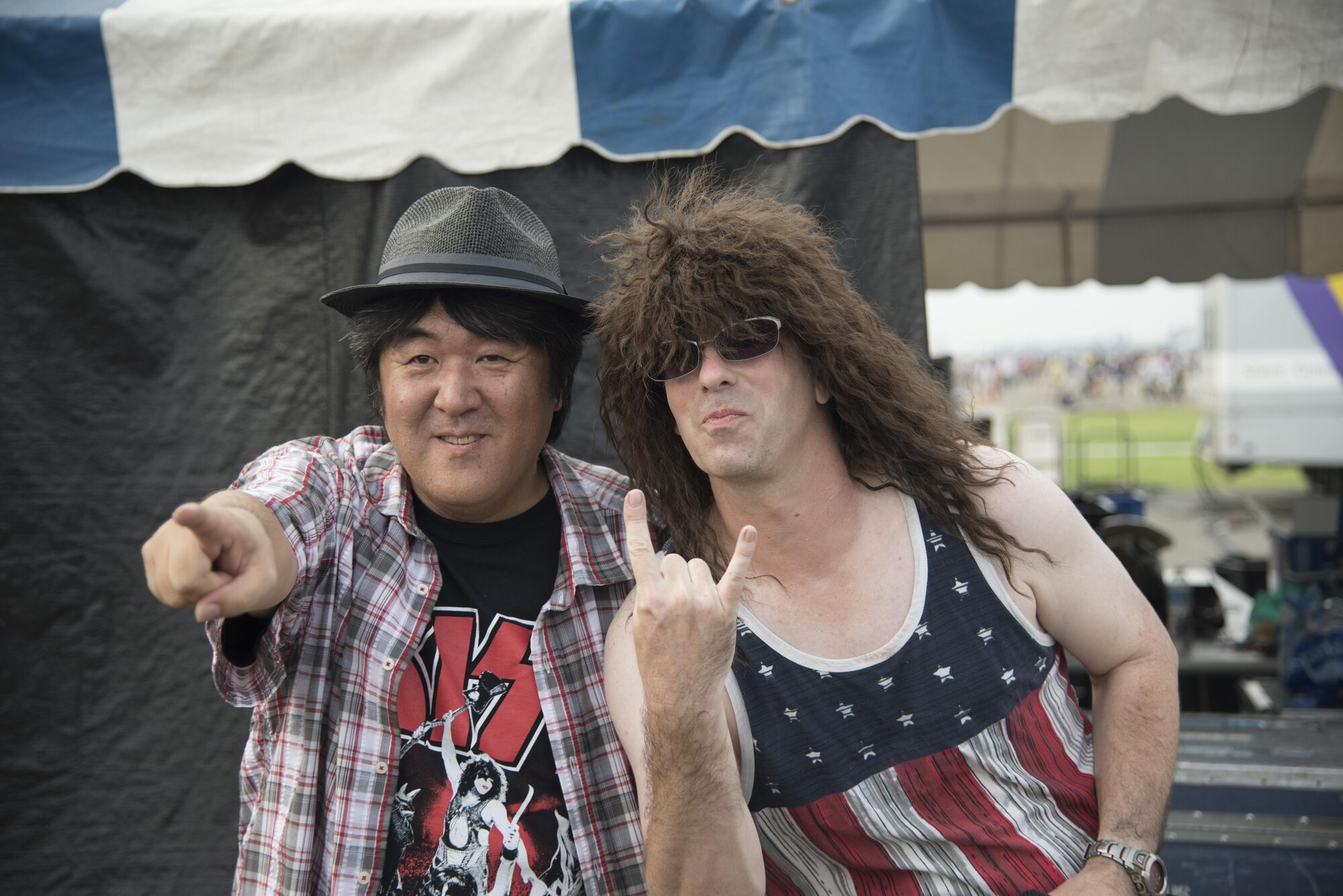 Andy Litchfield, lead singer of a Bon Jovi tribute band, poses for a picture during the 2016 Friendship Festival at Yokota Air Base, Japan, Sept. 17, 2016. The two-day Friendship Festival features bands, aircraft displays, food vendors and other performances. (U.S. Air Force photo by Staff Sgt. Michael Washburn/Released)