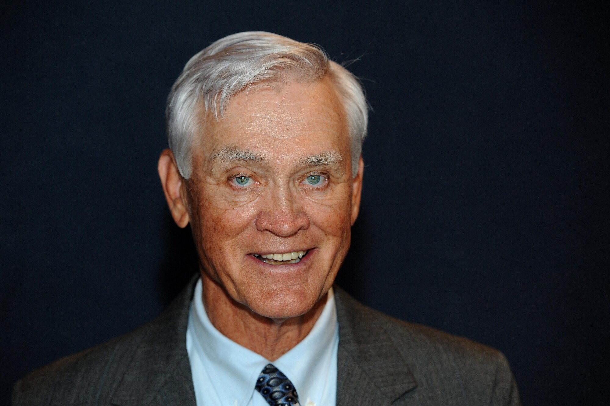 U.S. Air Force Lt. Col. (Ret.) Barry Bridger, former 43rd Tactical Fighter Squadron F-4 Phantom aircraft commander, smiles after sharing his story with Airmen and civilians from Team Langley as part of Prisoners of War/Missing in Action Recognition Day at Joint Base Langley-Eustis, Va., Sept. 15, 2016. Bridger was shot down and captured during his 1967 deployment to Ubon Royal Thai Air Force Base, Thailand, for a combat tour with the 497th Fighter Squadron to fly night-missions into North Vietnam. He was then imprisoned for 2,232 days in the “Hanoi Hilton” camp in North Vietnam. (U.S. Air Force photo by Staff Sgt. Nick Wilson)

