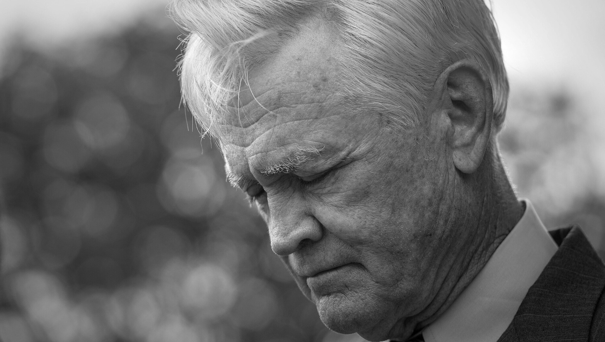 U.S. Air Force Lt. Col. (Ret.) Barry Bridger, former 43rd Tactical Fighter Squadron F-4 Phantom aircraft commander, bows his head in prayer during the invocation of a POW/MIA closing ceremony  at Joint Base Langley-Eustis, Va., Sept. 15, 2016. Bridger is a highly decorated veteran and survivor of six years in Vietnam's infamous “Hanoi Hilton” prison camp. (U.S. Air Force photo by Staff Sgt. Nick Wilson)

