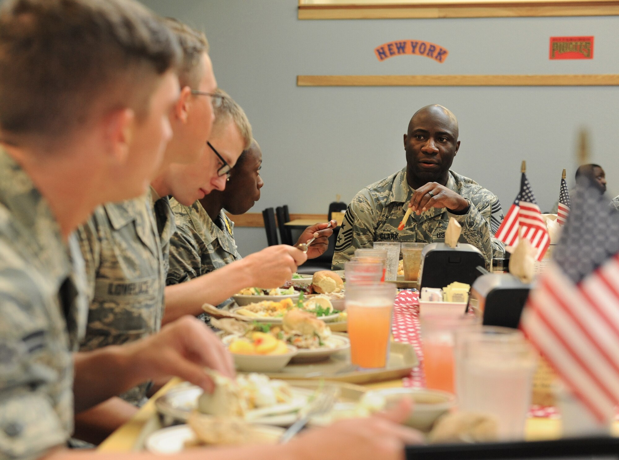 Chief Master Sgt. Vegas Clark, 81st Training Wing command chief, has lunch with Airmen from the 81st Training Group at the Magnolia Dining Facility during an immersion tour Sept. 12, 2016, on Keesler Air Force Base, Miss.  The purpose of the tour was to become familiar with the 81st TRG’s mission, operations and personnel. (U.S. Air Force photo by Kemberly Groue/Released)