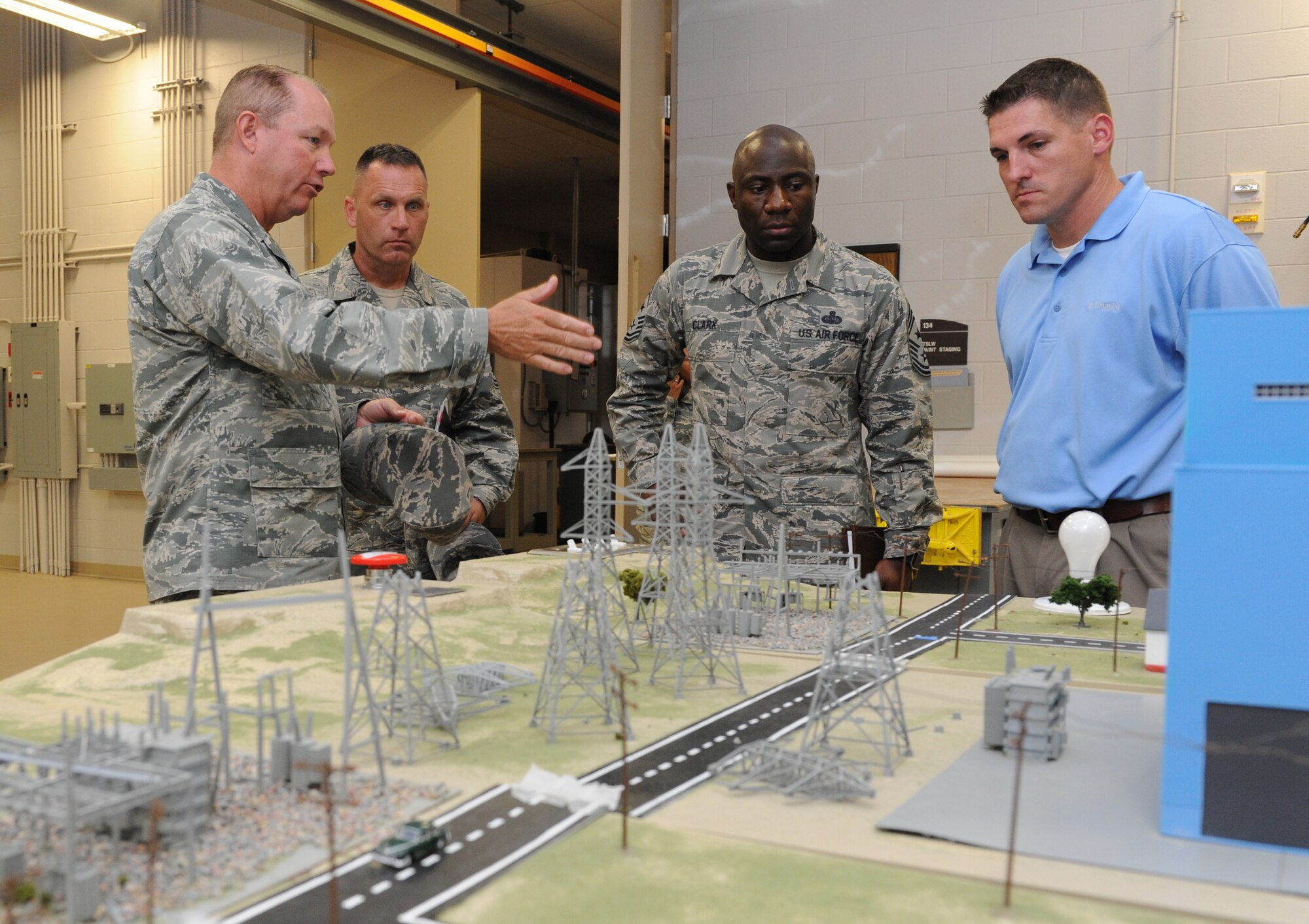 Col. Scott Solomon, 81st Training Group commander, briefs Chief Master Sgt. Vegas Clark, 81st Training Wing command chief, on the capabilities of the 81st Training Support Squadron’s Trainer Development Center during an immersion tour Sept. 12, 2016, on Keesler Air Force Base, Miss.  The purpose of the tour was to become familiar with the 81st Training Group’s mission, operations and personnel. (U.S. Air Force photo by Kemberly Groue/Released)