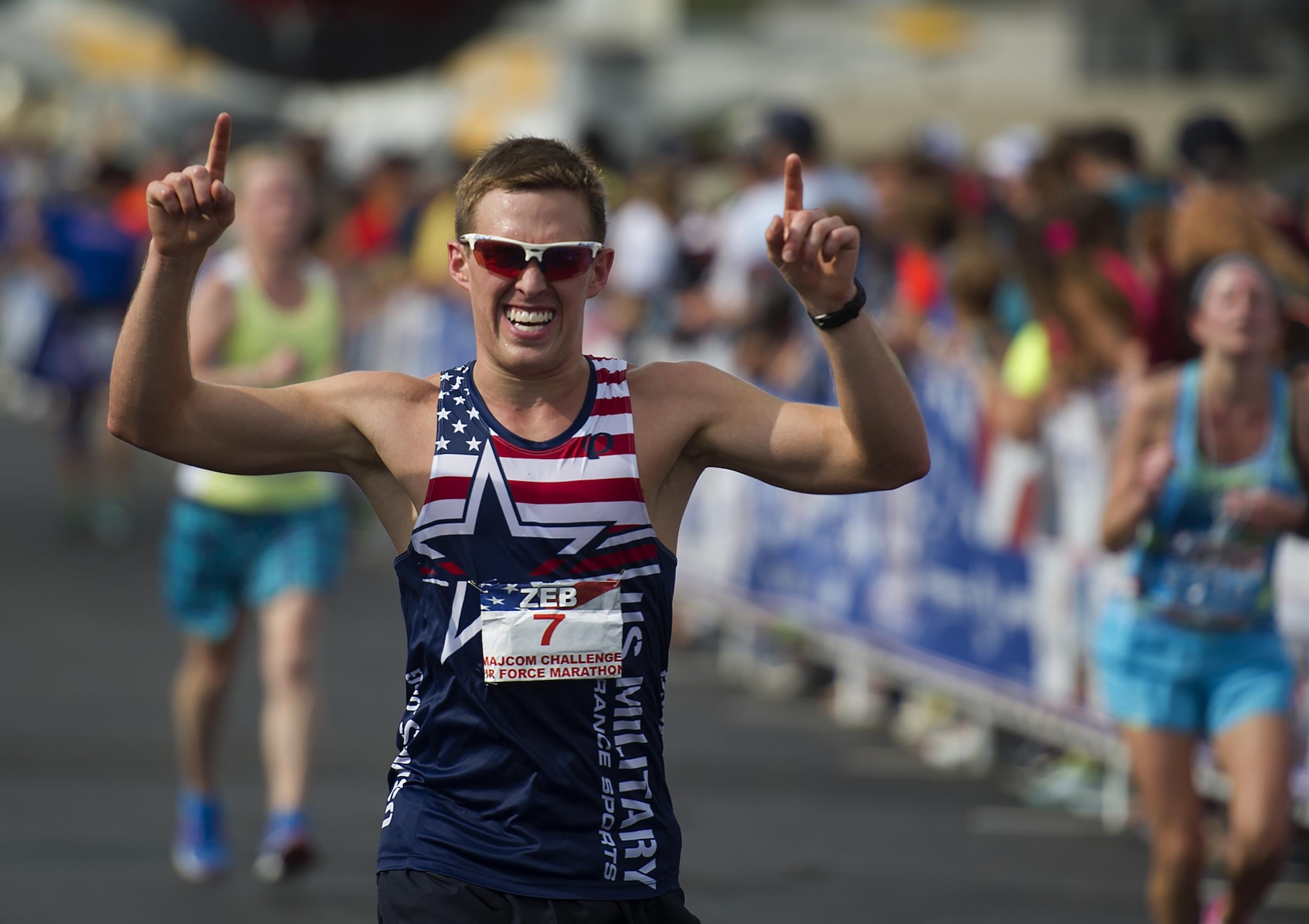 First Lt. Zebulon Hanley of San Antonio crosses the finish line to become the winner of the 20th U.S. Air Force Marathon men’s full marathon division at Wright-Patterson Air Force Base, Ohio, with a time of 2:47:04. (U.S. Air Force courtesy photo)