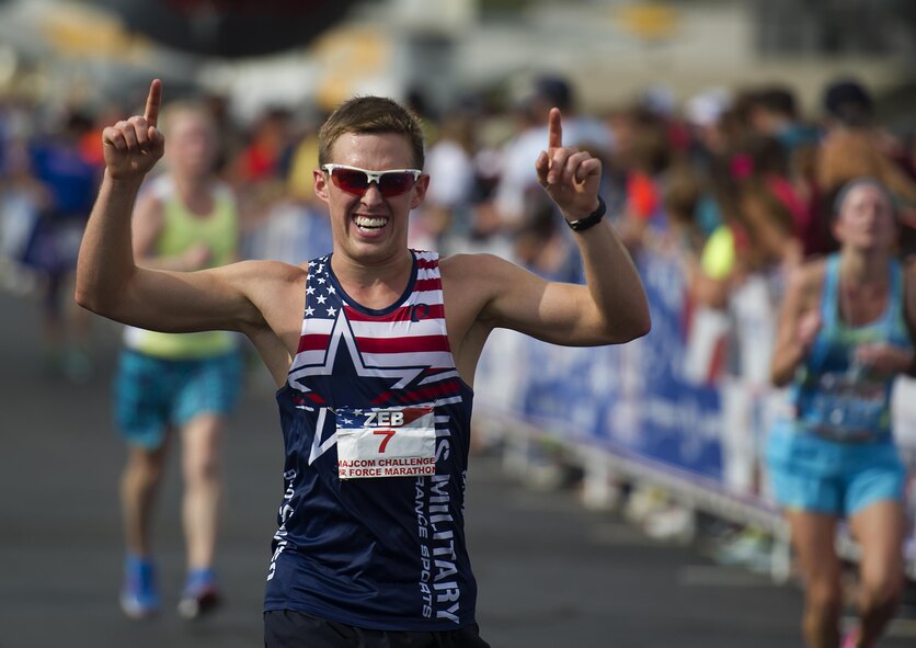 First Lt. Zebulon Hanley of San Antonio crosses the finish line to become the winner of the 20th U.S. Air Force Marathon men’s full marathon division at Wright-Patterson Air Force Base, Ohio, with a time of 2:47:04. (U.S. Air Force courtesy photo)