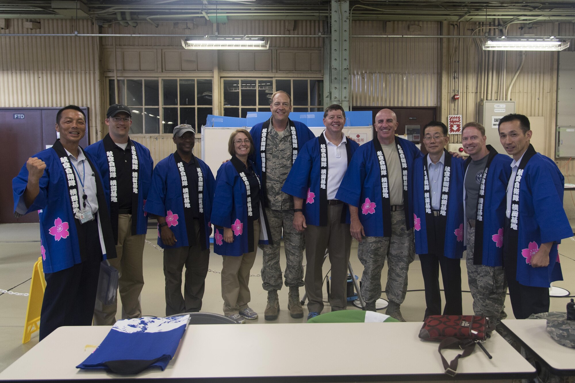 (Fourth from right) Col. Kenneth Moss, 374th Airlift Wing commander, poses with other Yokota leadership before participating in a Bon dance during the 2016 Friendship Festival at Yokota Air Base, Japan, Sept. 18, 2016. The Friendship Festival is a two-day bilateral event aimed at enhancing the United States and Japanese relationship. (U.S. Air Force photo by Staff Sgt. Michael Washburn/Released)