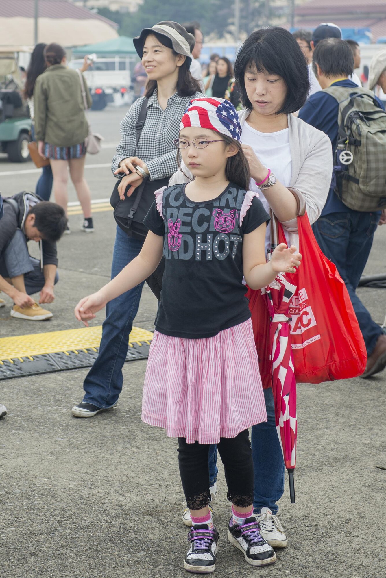 A young festivalgoer dons a star spangled bandanna at the 2016 Friendship Festival at Yokota Air Base, Japan, Sept. 18, 2016. The festival was an opportunity for visitors to experience American culture, while strengthening the bonds between Yokota and the local communities. (U.S. Air Force photo by Senior Airman David C. Danford/Released)

