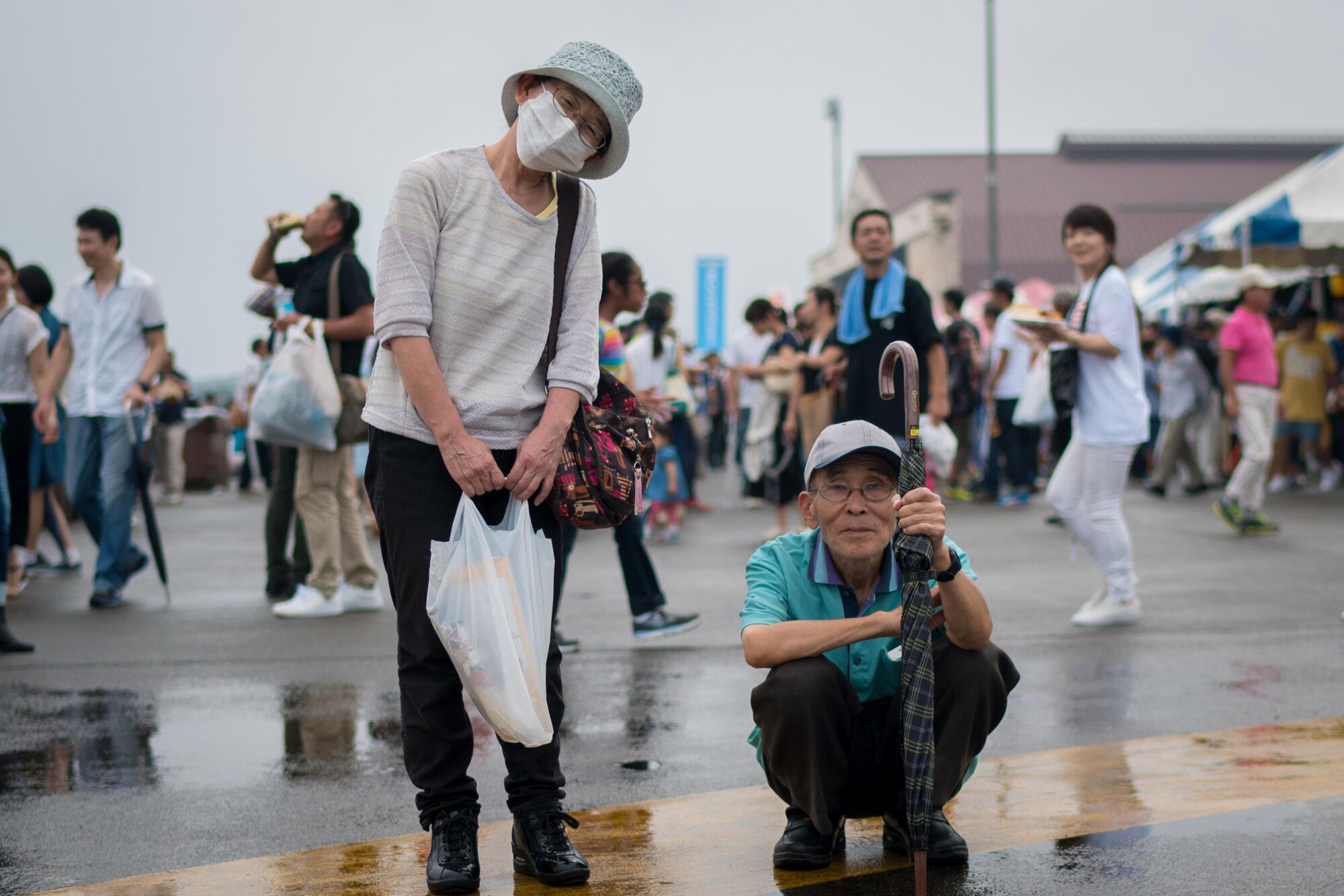 Festivalgoers pose for a photo during the 2016 Japanese-American Friendship Festival at Yokota Air Base, Japan, Sept. 18, 2016. Tens of thousands of people attend the festival every year to learn more about the US military and American culture.  (U.S. Air Force photo by Senior Airman Delano Scott/Released)
