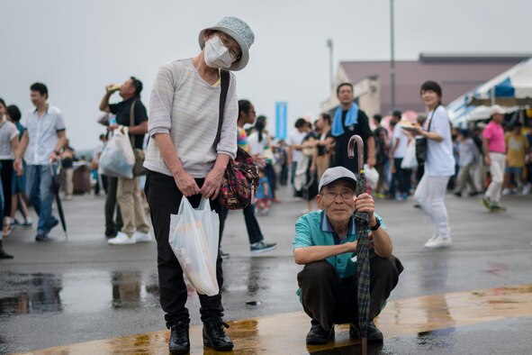 Festivalgoers pose for a photo during the 2016 Japanese-American Friendship Festival at Yokota Air Base, Japan, Sept. 18, 2016. Tens of thousands of people attend the festival every year to learn more about the US military and American culture.  (U.S. Air Force photo by Senior Airman Delano Scott/Released)