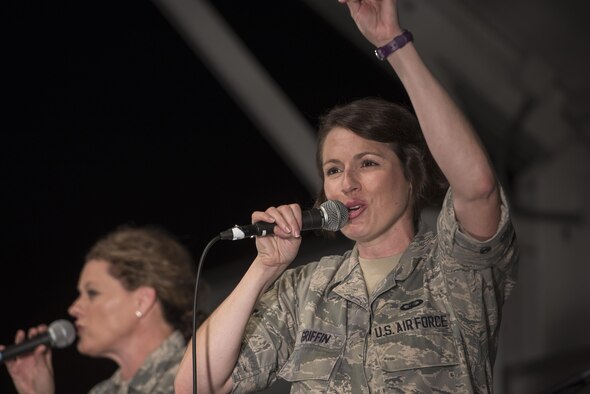 Staff Sgt. Joanne Griffin, vocalist with the Band of the Pacific-Asia, performs during the 2016 Japanese- American Friendship Festival at Yokota Air Base, Japan, Sept. 17, 2016. The festival gives community members a chance to come onto Yokota to see static aircraft, witness military demonstrations, learn about the capabilities and training done at Yokota and to meet with the US and Japan Self-Defense Force members who work and live here. (U.S. Air Force photo by Staff Sgt. Cody H. Ramirez/Released)