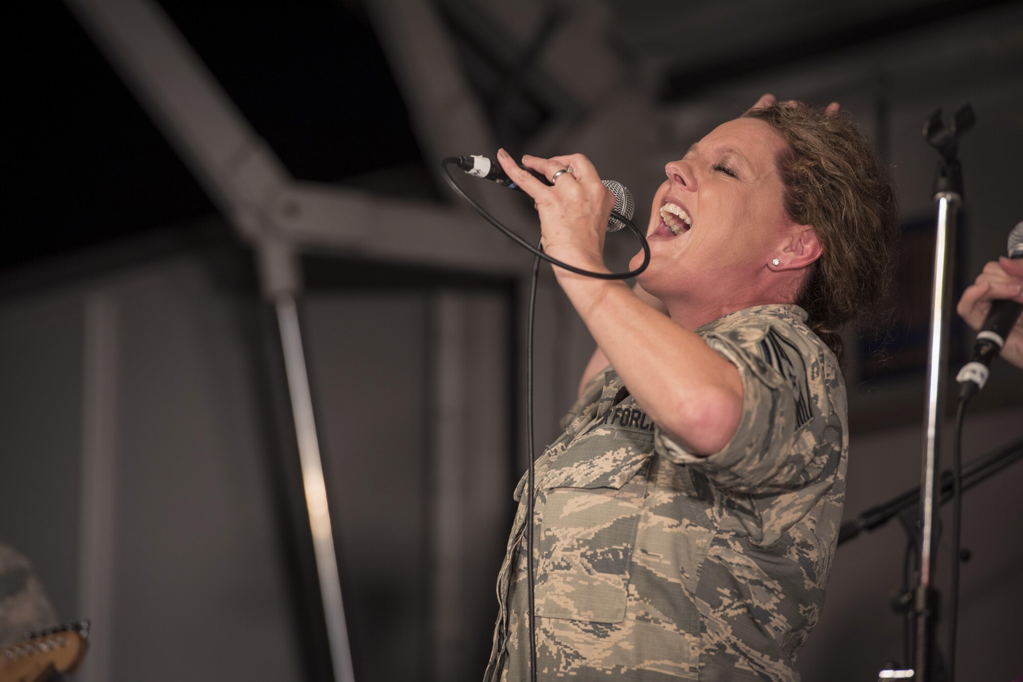 Master Sgt. Julie Bradley, vocalist with the Band of the Pacific-Asia, performs during the 2016 Japanese- American Friendship Festival at Yokota Air Base, Japan, Sept. 17, 2016. The festival is held annually at Yokota; more than 185,000 festivalgoers attended in 2015. (U.S. Air Force photo by Staff Sgt. Cody H. Ramirez/Released)