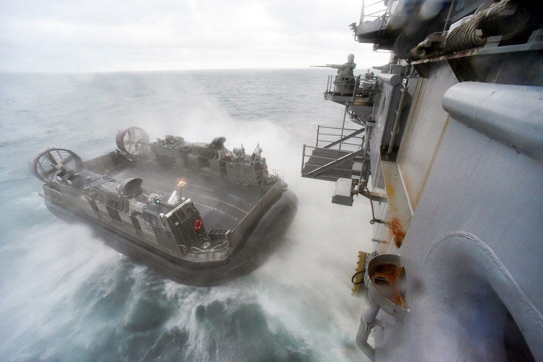 An air-cushion landing craft exits the USS Bataan during training in the Atlantic Ocean, Sept. 16, 2016. Navy photo by Petty Officer 1st Class Julie Matyascik