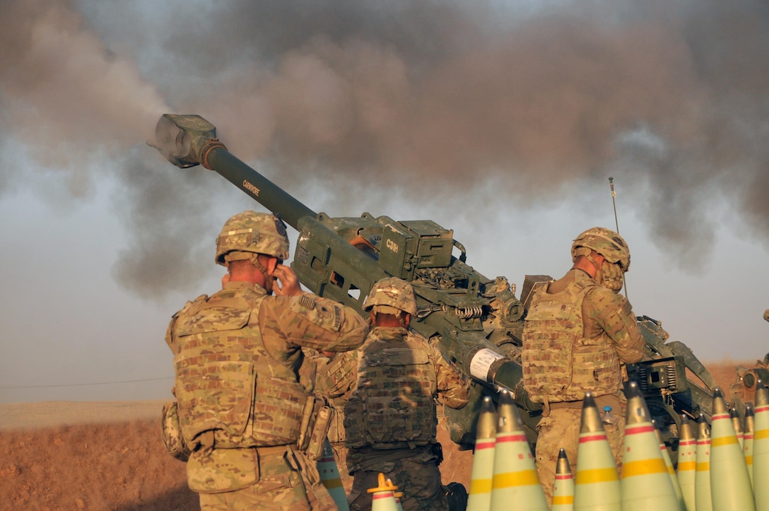 U.S Army Soldiers with Battery C, 1st Battalion, 320th Field Artillery Regiment, Task Force Strike, execute a fire mission in northern Iraq, Aug. 14 2016, during an operation to support the Iraqi army. Battery C is supporting the Iraqi security forces with indirect fires as retake territory from the Islamic State of Iraq and the Levant.  Artillery units in Iraq serve two roles: to provide force protection for Coalition and Iraqi security forces and to support ISF ground maneuver, enabling them to defeat Da’esh. (U.S. Army photo by 1st Lt. Daniel I Johnson/Released)