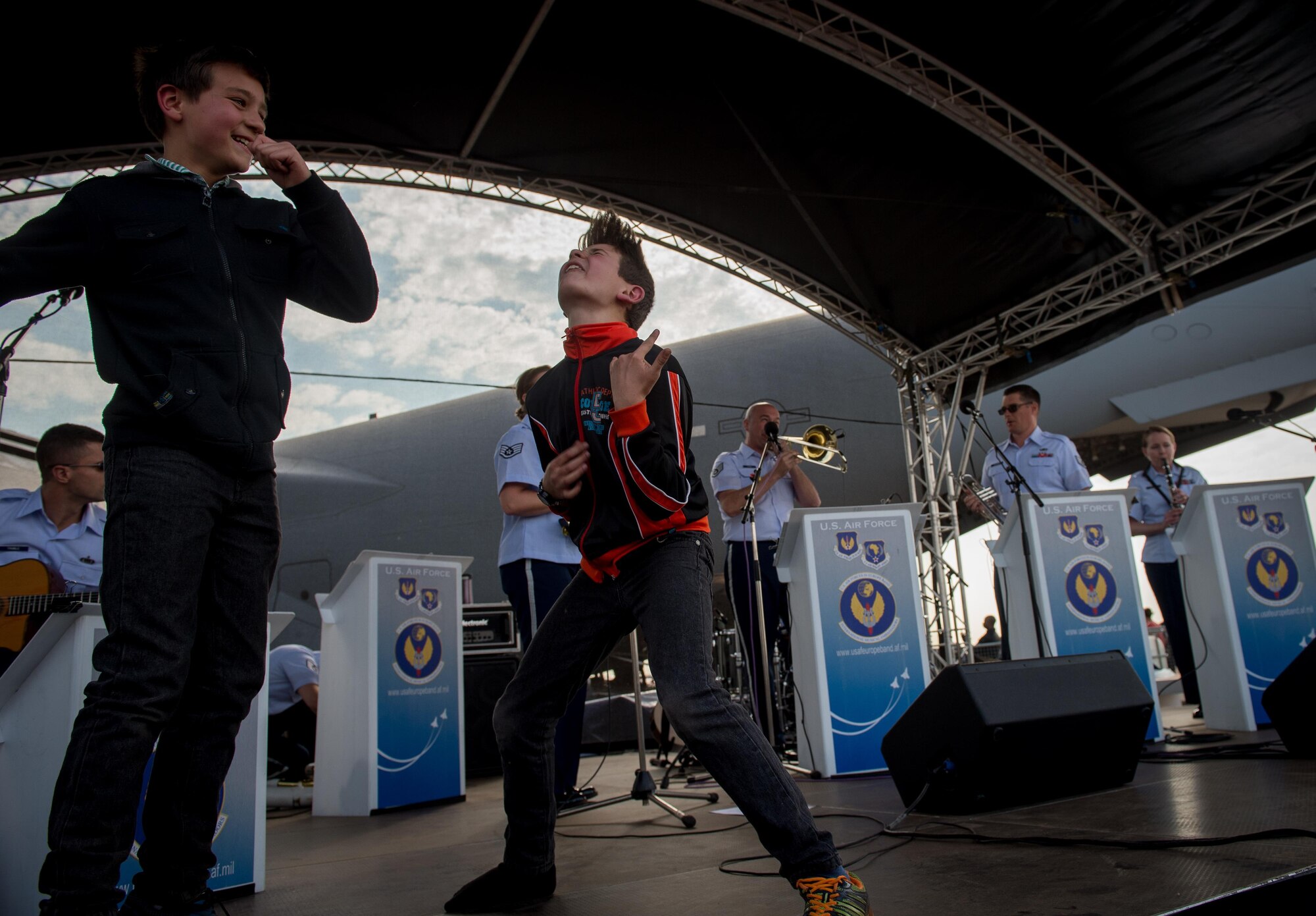 The U.S. Air Forces in Europe Band plays a show for the crowd at the Africa Aerospace and Defense Expo at Waterkloof Air Force Base, South Africa, Sept. 17, 2016. The U.S. military is exhibiting a C-17 Globemaster III, a KC-135 Stratotanker, a C-130J Super Hercules, an HC-130 King, and an MQ-9 Reaper. The aircraft come from various Air National Guard and Air Force Reserve Command units. The U.S. routinely participates in events like AADE to strengthen partnerships with regional partners. (U.S. Air Force photo by Tech. Sgt. Ryan Crane)