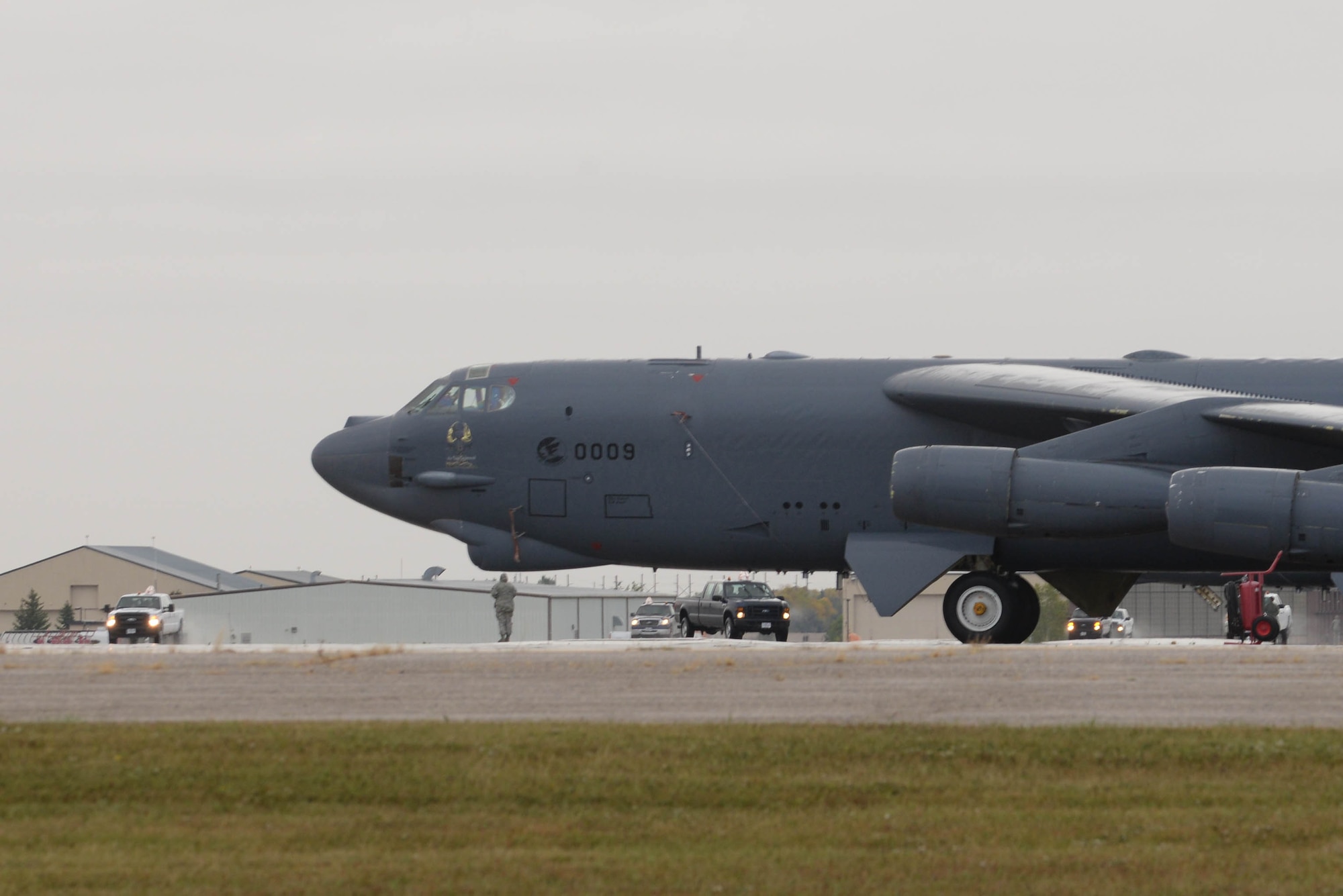 Members of a B-52H Stratofortress air crew drive towards their B-52 during Prairie Vigilance 16-1 at Minot Air Force Base, N.D., Sept. 16, 2016. The exercise concluded with a rapid fly off, successfully launching a sequence of 12 B-52s to showcase their active capability to execute the mission. (U.S. Air Force photo/Airman 1st Class Jessica Weissman)