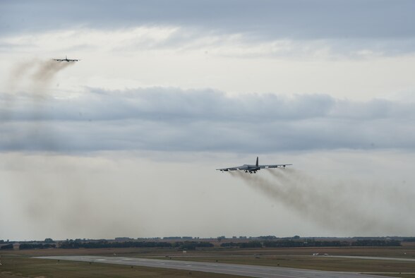 A B-52H Stratofortress takes off in succession of another during a rapid launch for Prairie Vigilance 16-1 at Minot Air Force Base, N.D., Sept. 16, 2016. As one leg of U.S. Strategic Command’s nuclear triad, Air Force Global Strike Command’s B-52s at Minot, play an integral role in nation's strategic deterrence.  (U.S. Air Force photo/Airman 1st Class Christian Sullivan)
