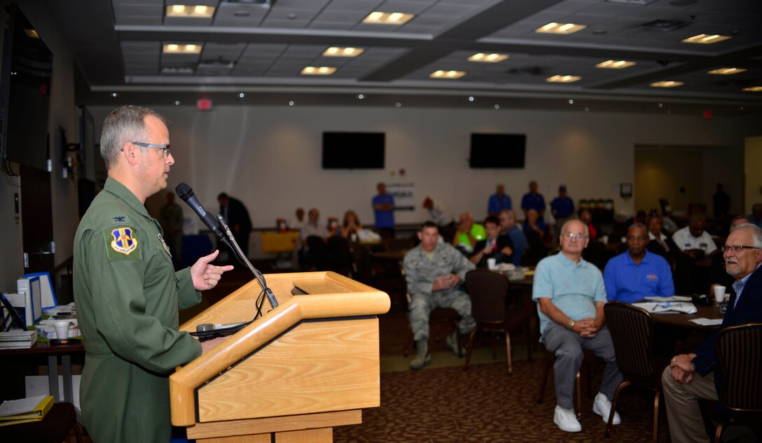 Col. Brian Bowman, 914 Airlift Wing Commander, speaks to a crowd of military retirees during Retiree Appreciation Day. The events of the day included tours of the C-130 aircraft and base, buffet lunch and retiree fair, hosted by Niagara Falls Air Reserve Station, N.Y. , September 17, 2016. (U.S. Air Force photo by Tech. Sgt. Steph Sawyer) 