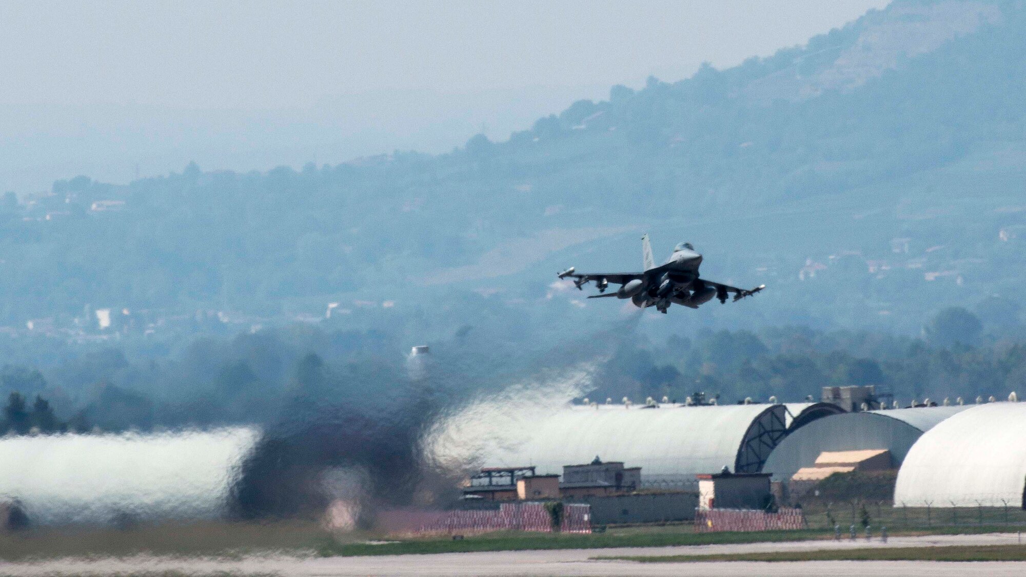 A 555th Fighter Squadron F-16 Fighting Falcon departs for Exercise Immediate Response 16 from Aviano Air Base, Italy on Sept. 14, 2016. The exercise, which uses computer-assisted simulations and field training exercises to improve multinational interoperability, runs until Sept. 23, 2016. (Photos by Airman 1st Class Cory W. Bush/Released)