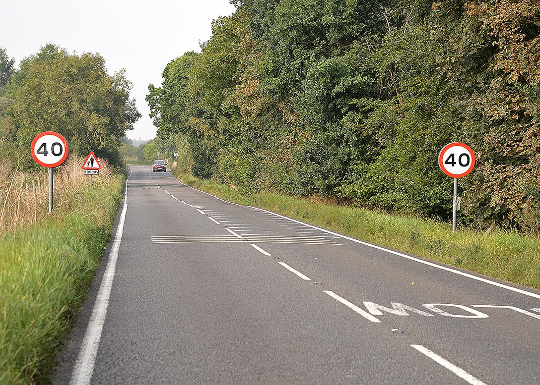 New speed limit signs have been posted on the roadside just outside Eriswell, near RAF Lakenheath, England. The speed limit along the C603 Eriswell Road, between RAF Mildenhall and RAF Lakenheath, has officially been reduced from 60 mph to 40 mph, effective immediately. Team Mildenhall members are reminded to slow down and stay safe. (U.S. Air Force photo by Karen Abeyasekere)
