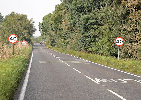 New speed limit signs have been posted on the roadside just outside Eriswell, near RAF Lakenheath, England. The speed limit along the C603 Eriswell Road, between RAF Mildenhall and RAF Lakenheath, has officially been reduced from 60 mph to 40 mph, effective immediately. Team Mildenhall members are reminded to slow down and stay safe. (U.S. Air Force photo by Karen Abeyasekere)