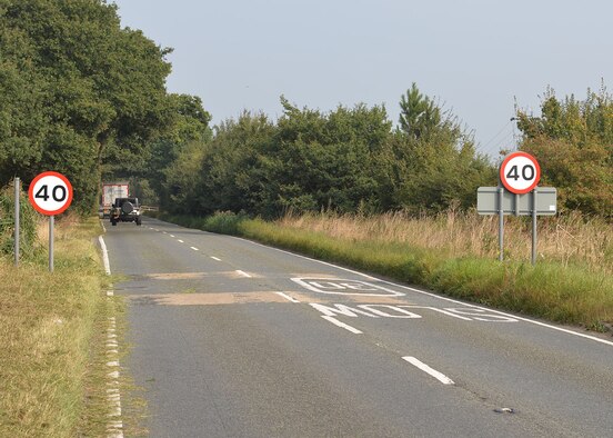 New speed limit signs have been posted on the roadside just entering Holywell Row, near RAF Mildenhall, England. The speed limit along the C603 Eriswell Road, between RAF Mildenhall and RAF Lakenheath, has officially been reduced from 60 mph to 40 mph, effective immediately. It’s illegal under UK law to drive faster than the posted speed limit. (U.S. Air Force photo by Karen Abeyasekere)

