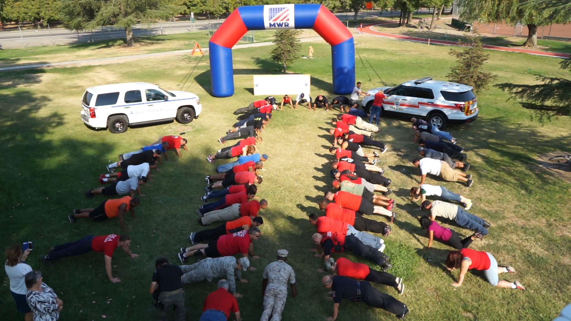 Employees participate in a 22 Push Up Challenge to raise awareness for the 22 veterans of the armed forces who commit suicide on a daily basis.