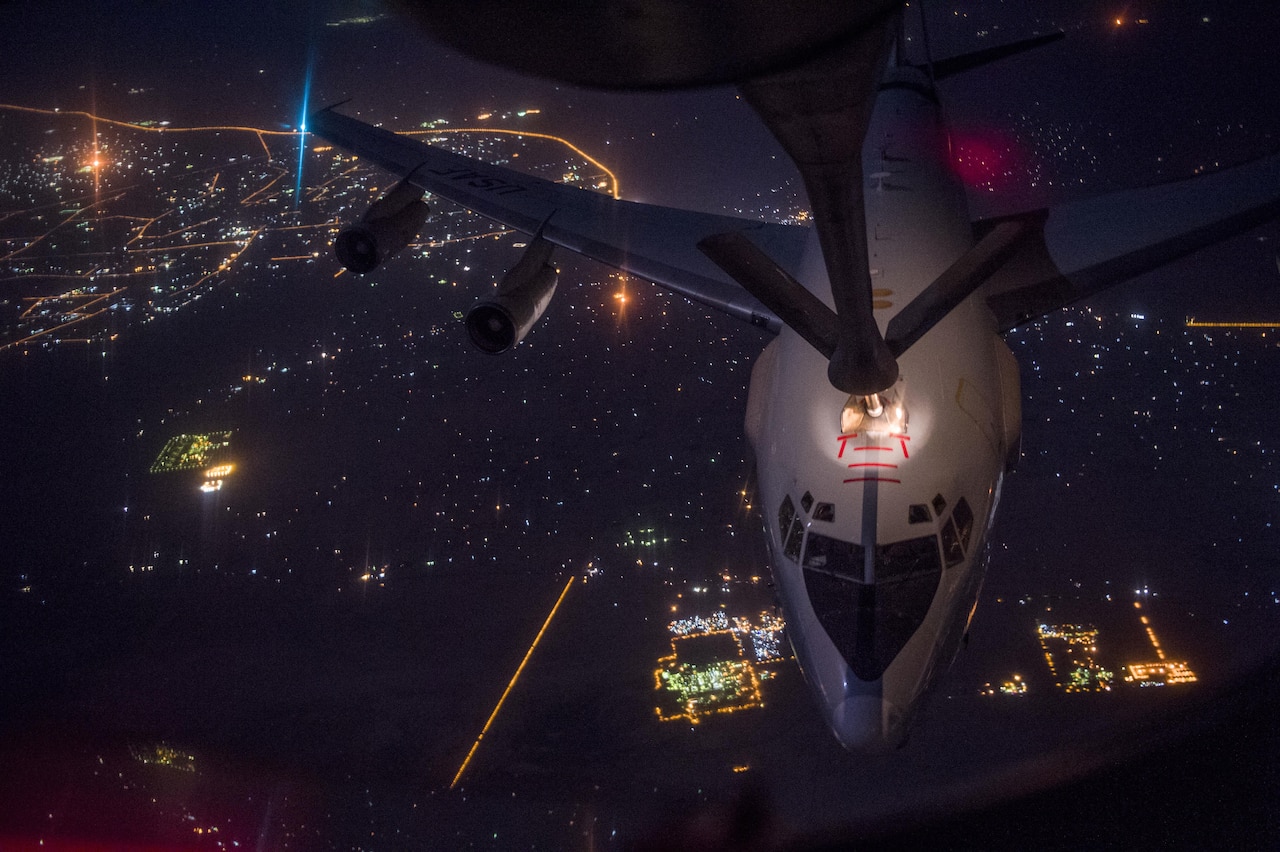 An Air Force E-3 Sentry aircraft meets a KC-135 Stratotanker during a refueling mission over Iraq while supporting Operation Inherent Resolve, Sept. 16, 2016. Air Force photo by Staff Sgt. Douglas Ellis