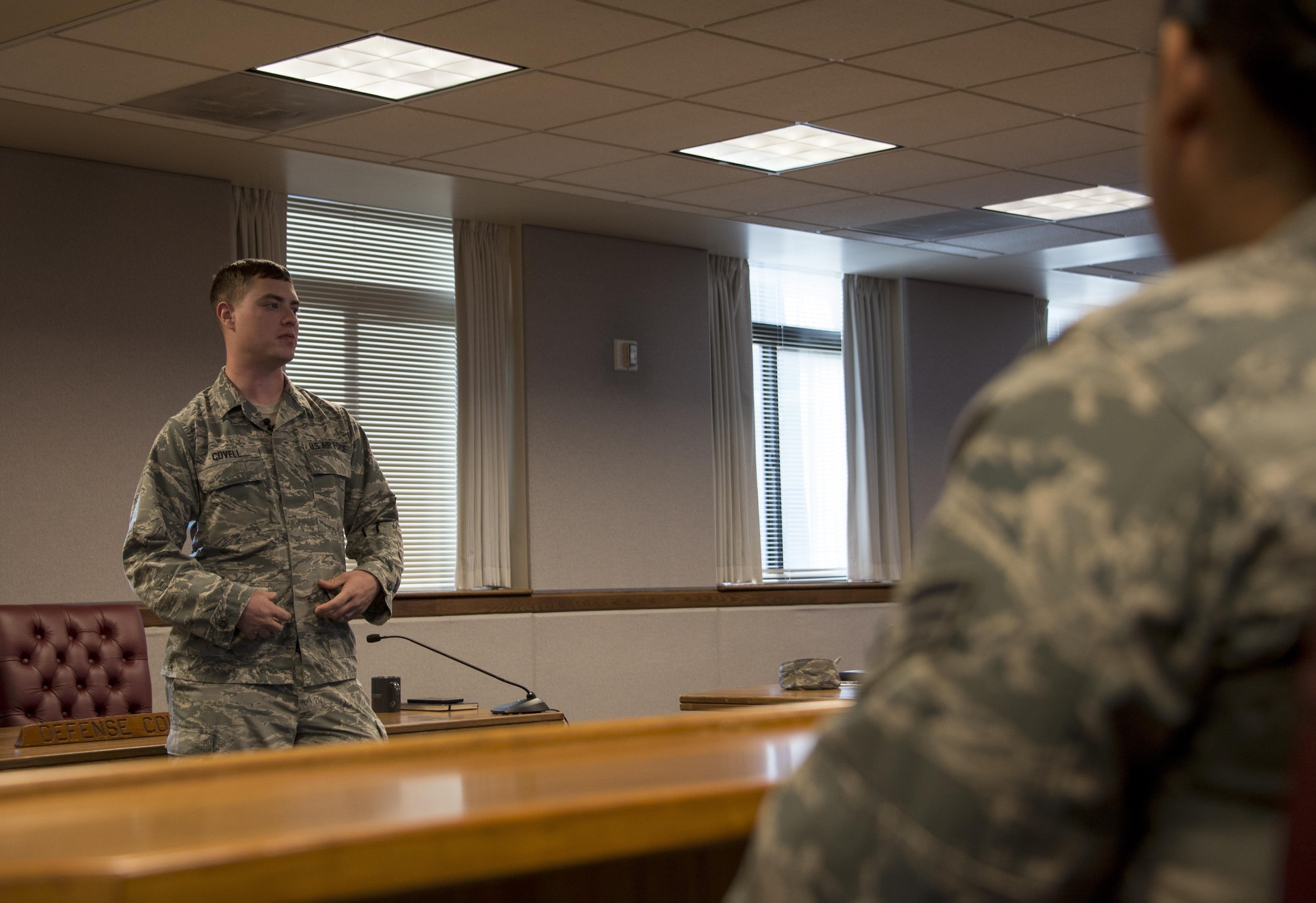 Airman basic Kendall Covell, 60th Communications Squadron, left, shares his personal story of being recently court-martialed to Airmen participating in the True North program at Travis Air Force Base, Calif., Sept. 15, 2016. The True North program showcases the full spectrum of the military judicial process including incarceration. (U.S. Air Force photo by Staff Sgt. Charles Rivezzo) 