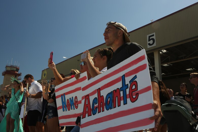 Family and friends wait for the arrival of service members with Marine Light Attack Helicopter Squadron (HMLA) 267 aboard Marine Corps Air Station Camp Pendleton, Calif., Sept. 10. HMLA-267 and other units from 3rd Marine Aircraft Wing returned from a seven-month deployment with the 13th Marine Expeditionary Unit after conducting operations from the Western Pacific to the Arabian Gulf to include strikes against ISIL targets in Iraq. (U.S. Marine Corps photo by Pfc. Liah Kitchen/Released)