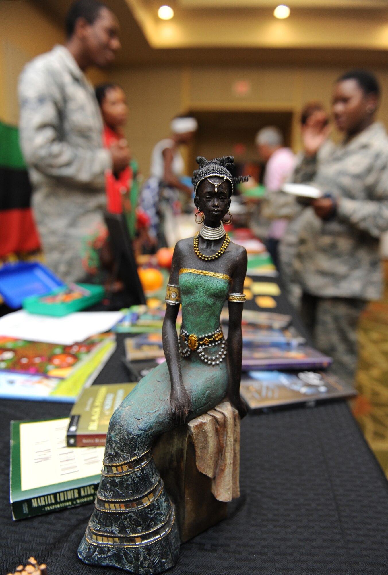 An African figurine sits on display during Diversity Day at the Bay Breeze Event Center Sept. 13, 2016, on Keesler Air Force Base, Miss. The cultural celebration included food sampling and information booths about countries around the world and other special emphasis groups. (U.S. Air Force photo by Kemberly Groue/Released)