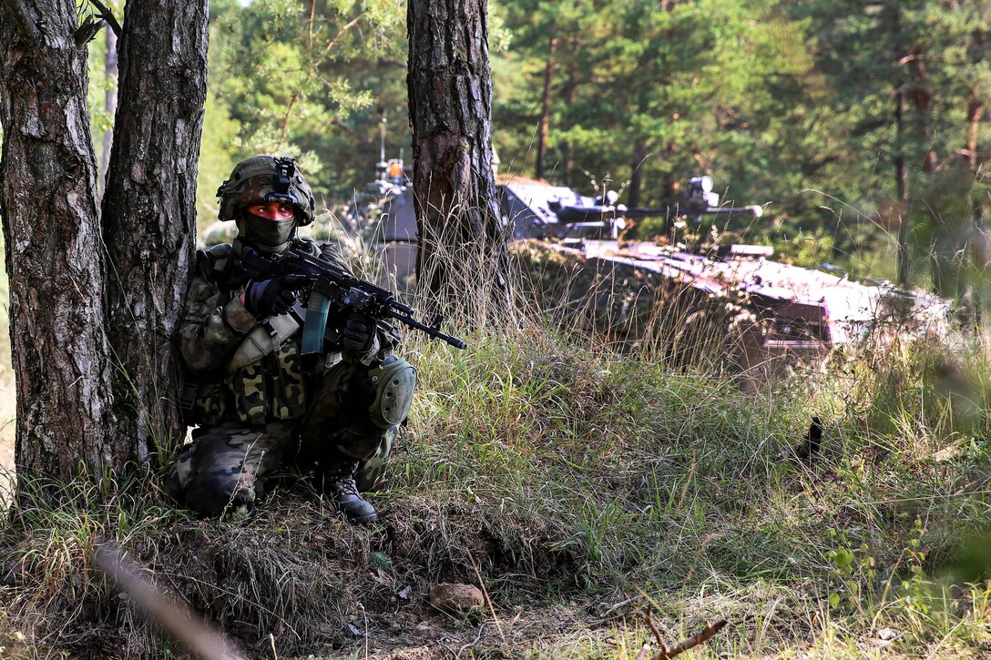 A Polish soldier covers his teammates during defensive operations as part of exercise Combined Resolve VII in Hohenfels, Germany, Sept. 11, 2016. Army photo by Sgt. Matthew Hulett
