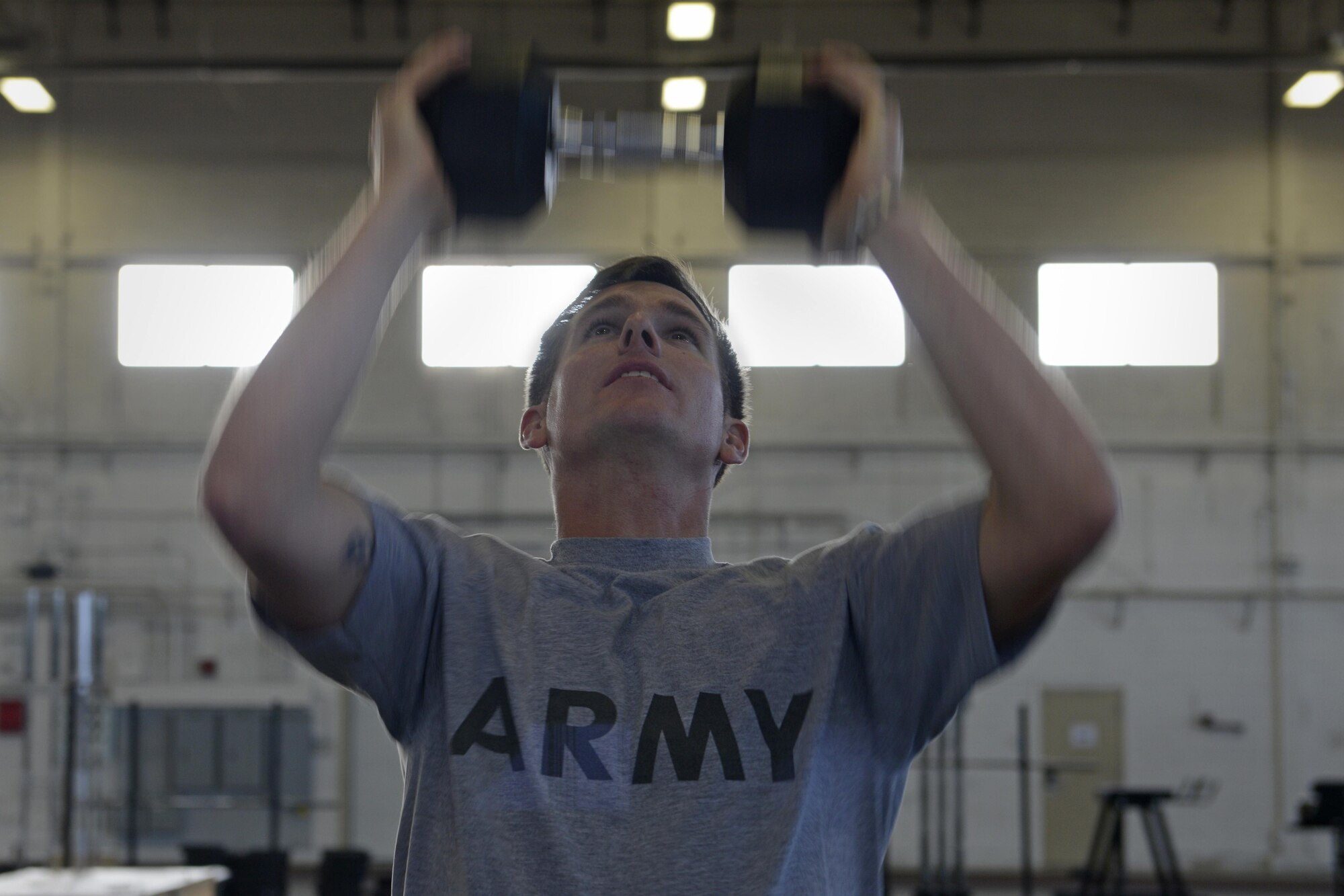 Army Staff Sgt. Matthew Mobley, assigned to the 545th Military Police Detachment, 17th Combat Sustainment Support Battalion, U.S. Army Alaska, performs a set of repetitions in Hangar 5 at Joint Base Elmendorf-Richardson, Alaska, Aug. 29, 2016. Mobley is part of a six-member team preparing to compete in the Pacific Air Forces Advanced Combat Skills Assessment hosted in Guam, Sept. 25 to 29, 2016.   