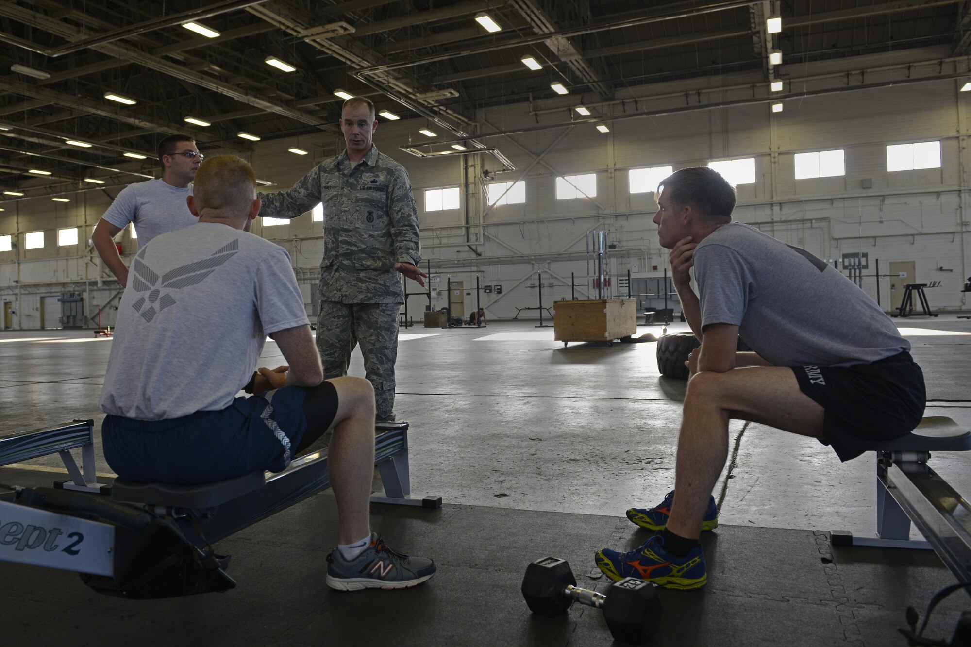 Senior Master Sgt. Eric Hall, 673d Security Forces Squadron superintendent, speaks to team members in Hangar 5 at Joint Base Elmendorf-Richardson, Alaska, Aug. 29, 2016. The team consists of six members who will compete in the Pacific Air Forces Advanced Combat Skills Assessment hosted in Guam, Sept. 25 to 29, 2016. 