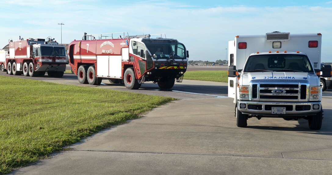 Emergency response vehicles sit at the scene of an Emergency Management exercise Sept. 13, 2016, at MacDill Air Force Base, Fla. Emergency first responders were called out to a simulated oil spill caused by a GOV crashing and rupturing a fuel pipeline. (U.S. Air Force photo by Senior Airman Vernon L. Fowler Jr.)