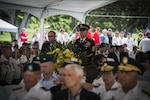 U.S. Army Sgt. Maj. Michael E. Swam, Defense POW/MIA Accounting Agency senior enlisted eader, right, and Mr. George Gagne, acting DPAA chief of staff prepare to lay a wreath during the National POW/MIA Recognition Day ceremony hosted by DPAA at National Memorial Cemetery of the Pacific, Honolulu, Hawaii, Sept. 16, 2016. The event is held every year on the third Friday of September in honor of those who were prisoners of war (POW) and those who are missing in action (MIA). DPAA's mission is to provide the fullest possible accounting for our missing personnel to their families and nation.  (U.S. Marine Corps photo by Sgt. Eric Laclair) 